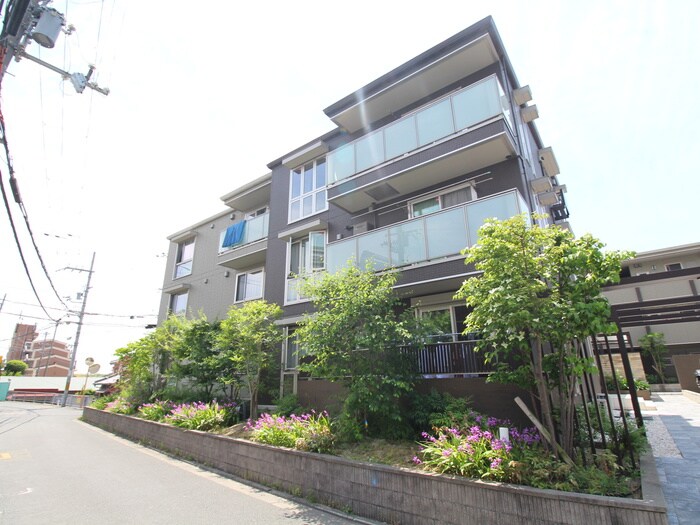 サンスクエア千里万博A棟の物件外観写真