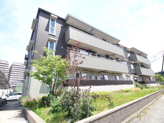 サンスクエア千里万博B棟の物件外観写真