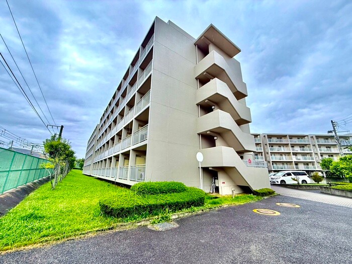 アーバンエース松井山手パル寮棟の物件外観写真