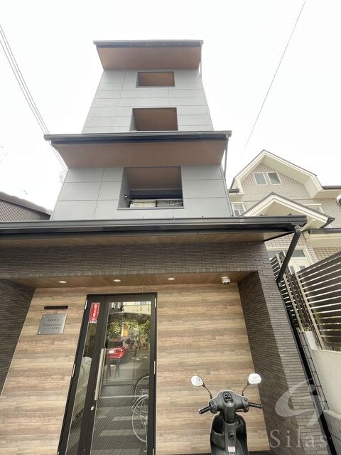 サントス堀川紫明の物件外観写真