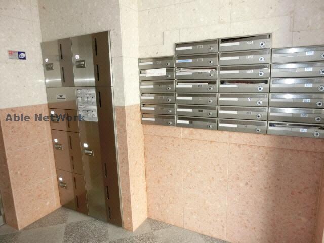 自治会館入口 徒歩3分 6階の物件外観写真