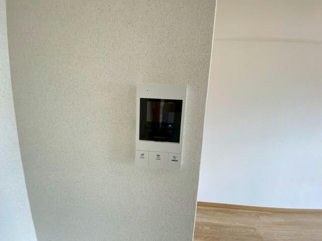 自治会館入口 徒歩3分 6階の物件内観写真