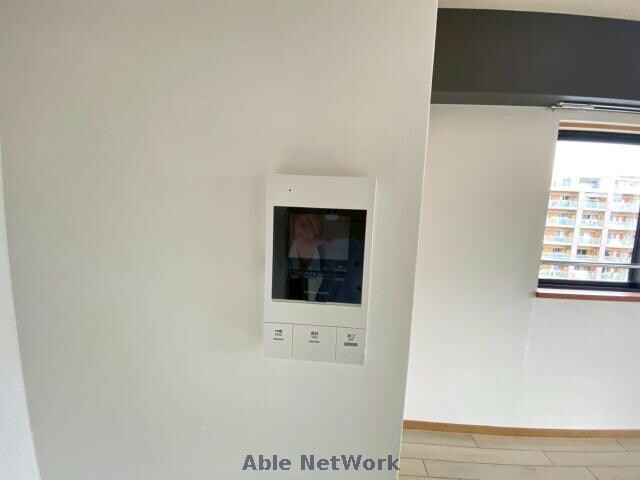 自治会館入口 徒歩3分 6階の物件内観写真